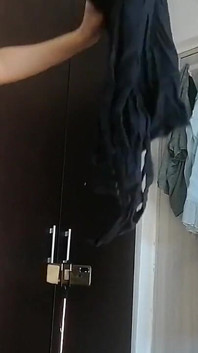 Sexy Latina Having Fun Trying on Clothes and Cutting Them