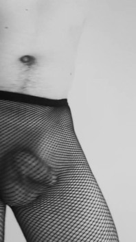 Sexy teen boy dances with only fishnets tease