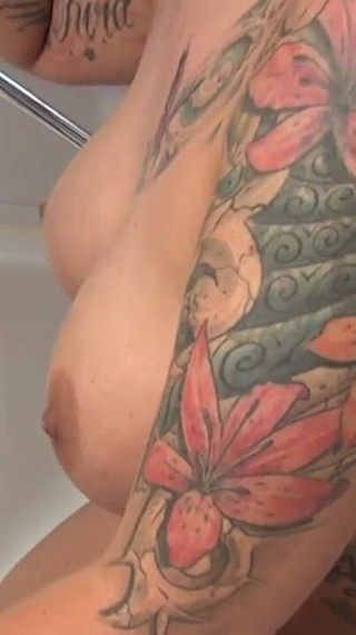 Thumbnail of Tattooed big boobs loves the cock in pussy in mouth in the bathroom