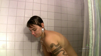 Thumbnail of Artemisia is a short haired natural cutie and she starts this clip by peeing on camera