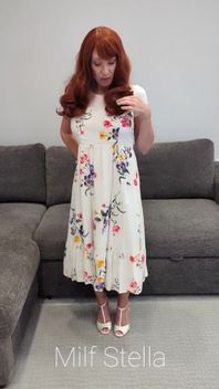 A Redhead in a Dress