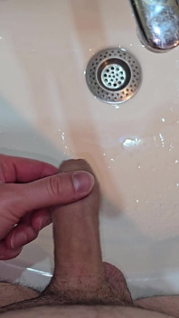 Pissing to the Bathroom Sink