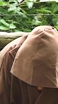 Hooded Mature Man Endures Clamps and Heavy Chains