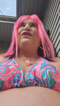 Sitting Outside Sunbathing and Teasing Men!