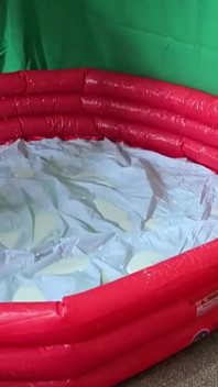 Milky Goddess in a Paddling Pool