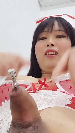 The Sultry Nurse Stretches Her Urethral Opening thumbnail