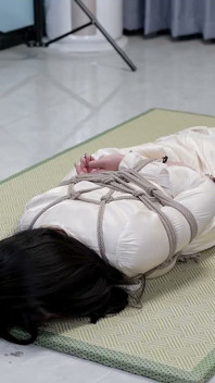 Girlfriend in a Dress and Stockings, Bound by Rope