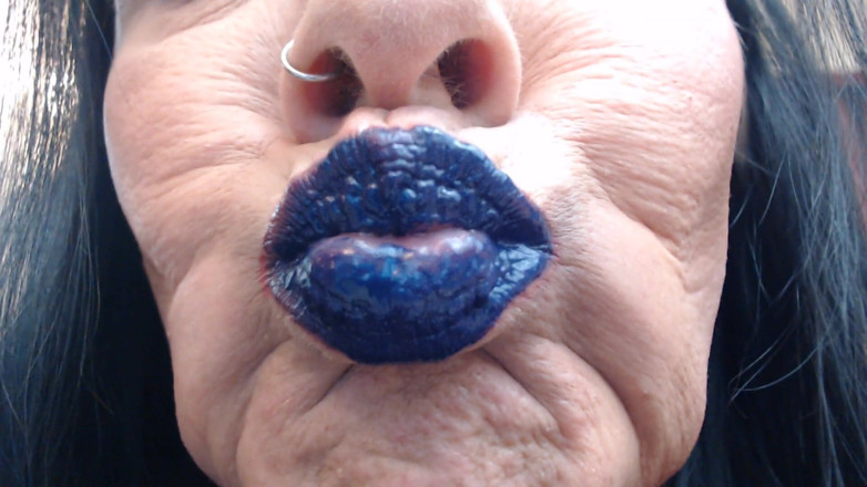 Abby Anna: Blue purple lip wand closeup duck