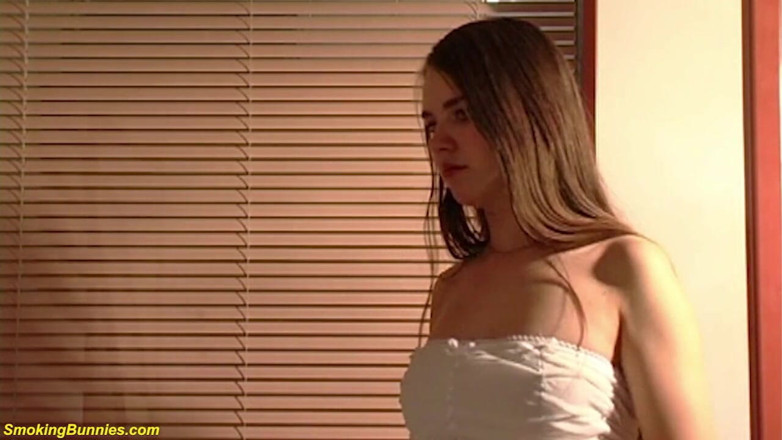 Smoking Bunnies: Cute teen smoking her first cigarette