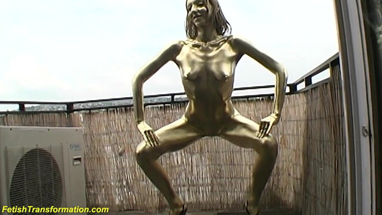 Fetish Islands: Real gold body painted teen statue