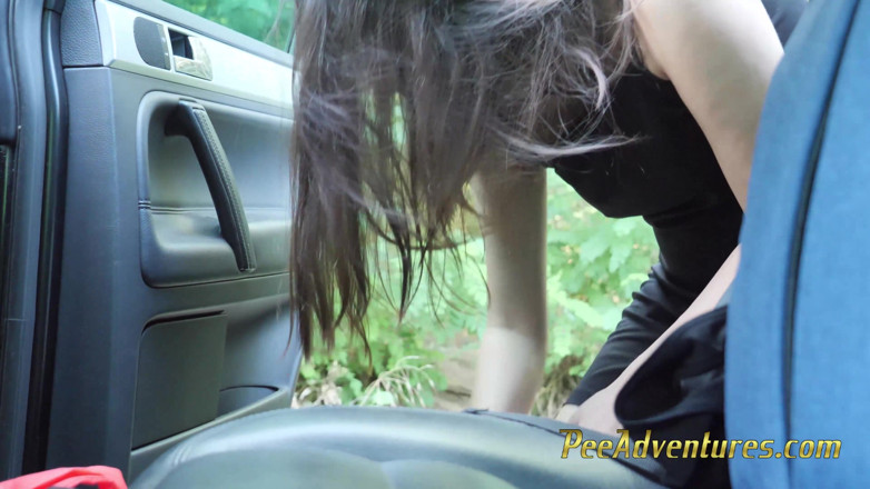 Pee Adventures: Sexy brunette changing her pee stained clothes outside