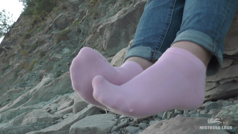 Mistress Legs: Sexy feet in pink ankle socks on the seashore