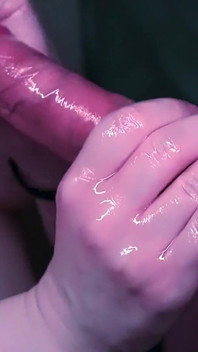 A Bitch in a Mask Loves to Jerk off Dick with Oil