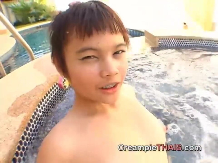 Creampie Thais: Cute asian teen with short hair takes big dick in...