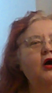 Mature BBW Redhead Nurse Vicki Talks to You as She Makes a Lipstick Applying Video for You!