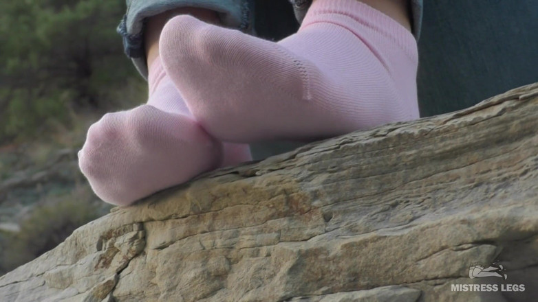 Mistress Legs: Sexy feet in pink ankle socks on the seashore