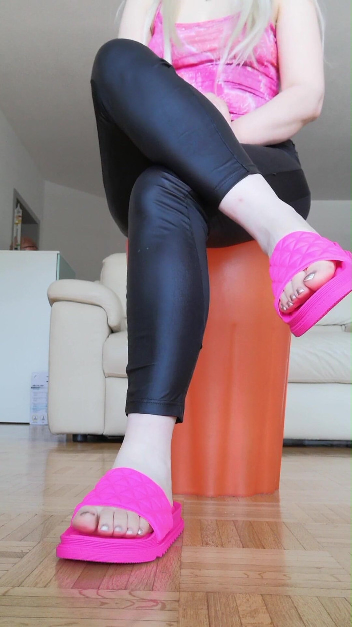 RavenBigAss: Raven: Toe-tapping with Crossed Legs Latex Trousers and Fuchsia Slides