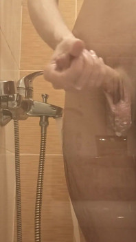 A Young Guy Washes in the Shower and Dreams of Someone Being Next to Him