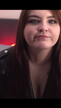 Pretty Woman in a Leather Jacket Dancing Before Sex