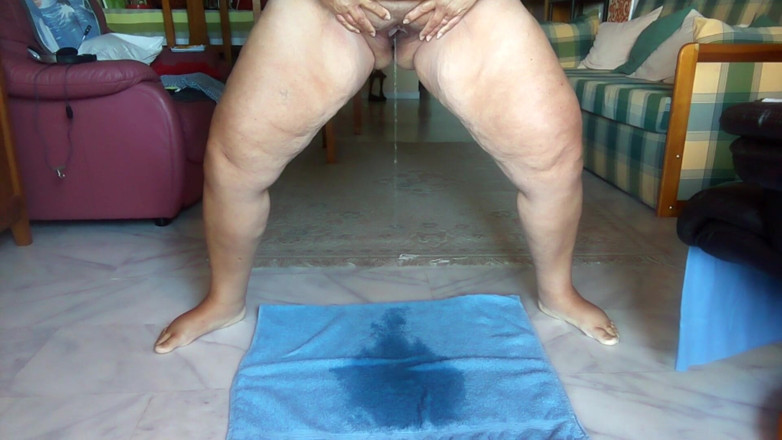 Sex hub couple: Jen is standing up and is peeing on a towel...