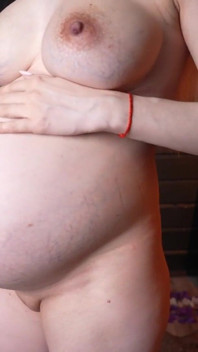Pregnant Naked in Stockings