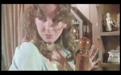 A sweet bitch has some trouble to eat John Holmes's huge cock