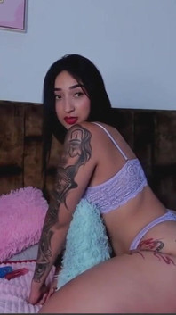 Tattooed Woman with a Delicious Ass