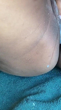 A Sri Lankan Girl Plays with an Eggplant