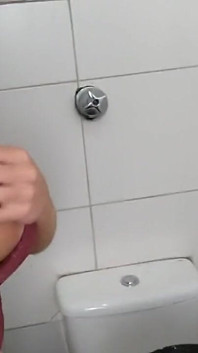 Paloma Veiga and Masked in a Public Bathroom