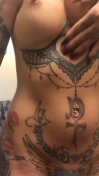 Busty Tattooed Babe