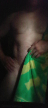 Young Man Poses for the Camera After a Shower