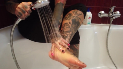 Fetish videos by Alex: Tattooed Blonde MILF Washes Her Feet