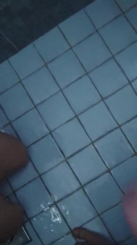 Pregnant Brunette Gets Pissed on Her Oiled Tits