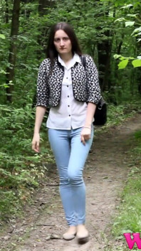 Desperate Brunette in a Forest Holding Her Crotch to Stop Herself From Pissing in Her Jeans