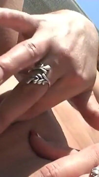 A blonde masturbates with her sex toy in the garden enjoying like a slut