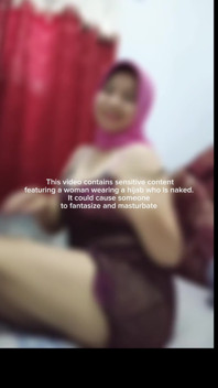Woman Wearing a Hijab Who Is Naked