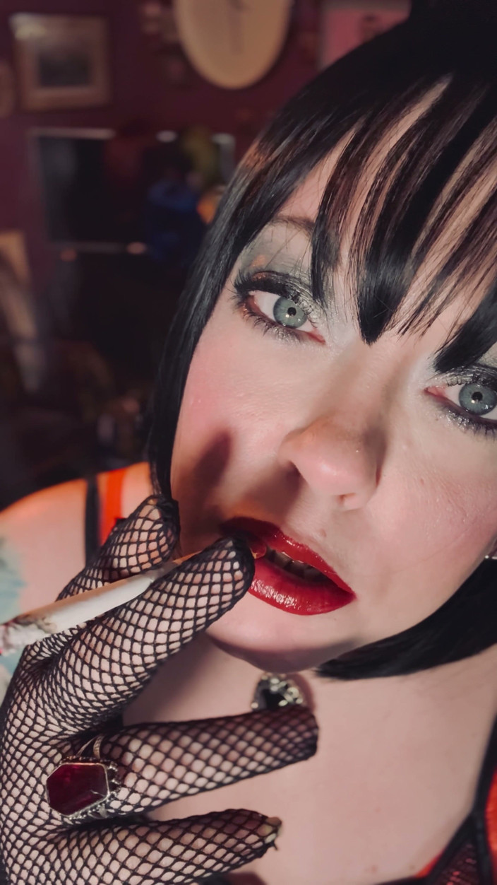 Tina Snua: Smoking Mistress Tina Snua Chain Smokes 2 Superking Cigarettes in Fishnet...