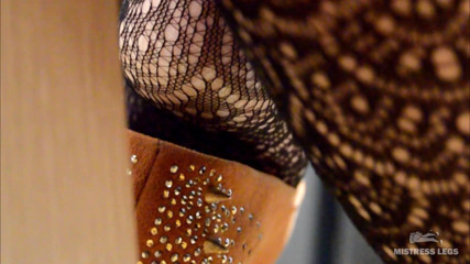 Mistress Legs: My lazy dangling shoe on the feet in black fishnets