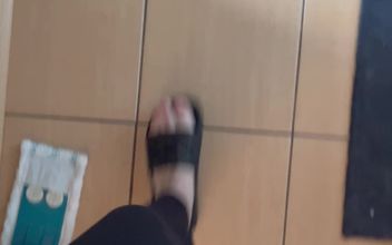 Feet in Flip-flops and Walking in Flip-flops