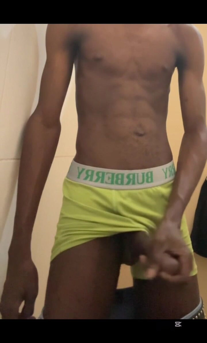 Slimniqqa: Sexy Teen with Abs Stroking His Big Black Cock
