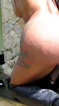 Big boobed brunette t-girl spanks her meat