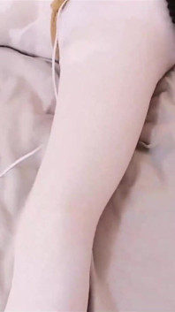 Pink Jk Girl's Turtle Shell Is Tied up in Multiple Bundles
