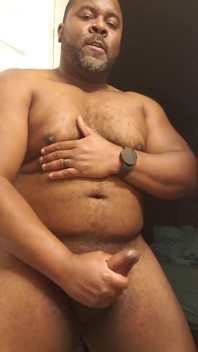 Rubbing My Big Belly as I Stroke My Black Cock
