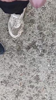 Friend Is Holding My Cock While Im Peeing on the Ground Outdoor