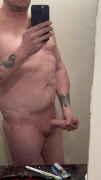 Masturbating