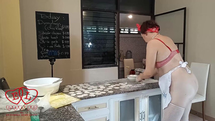 Strange stepfamily: Nudist housekeeper Regina Noir cooking at the kitchen. Naked maid...