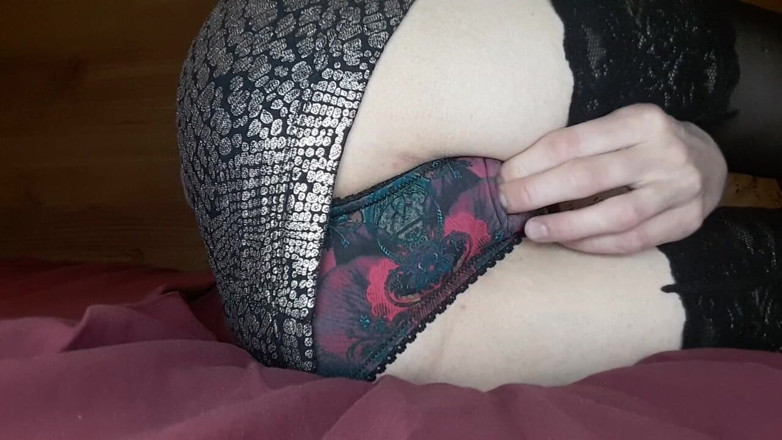 Christy G: Sexy teen in stockings and dress masturbates with fingers.