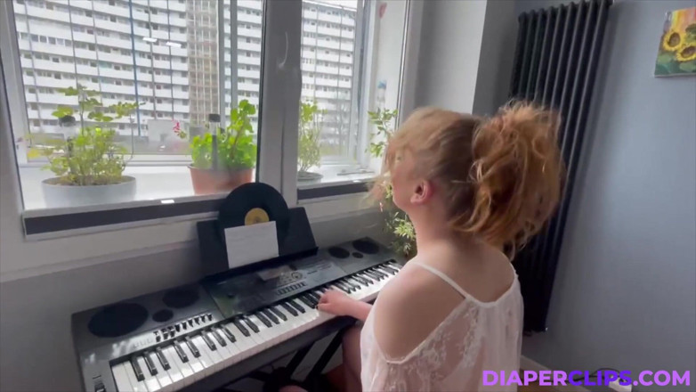 Nicole White: Playing on Keyboard.