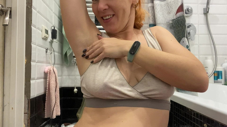 Hairy couple: Strong Woman Shows Her Muscles and Armpits