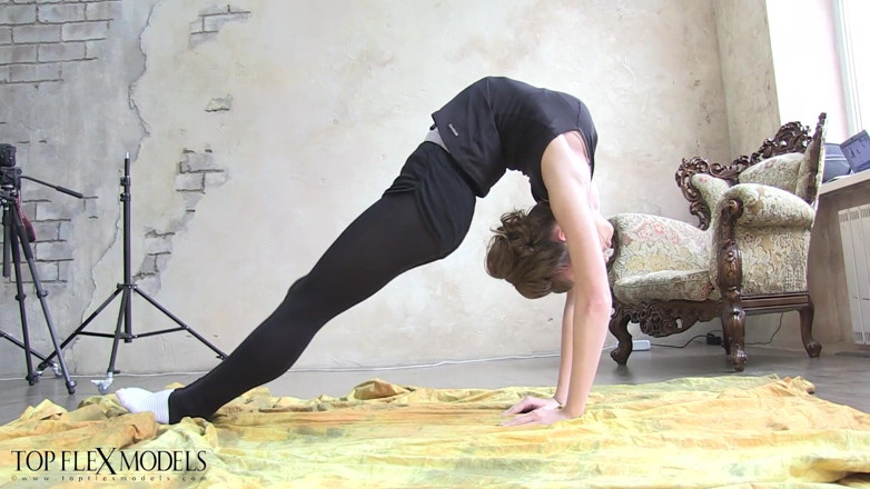 Gymnastic: Exercícios de alongamento de uma bailarina
